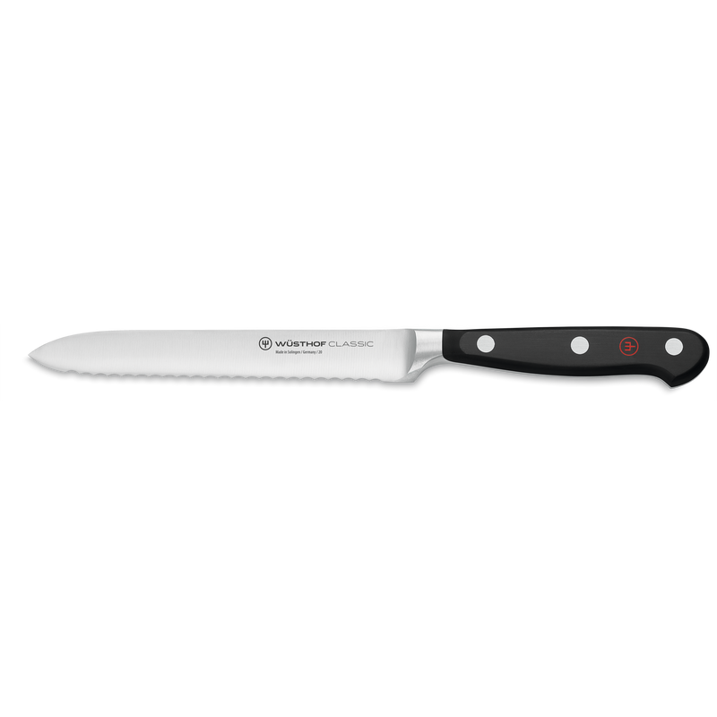 Classic 11-Piece Knife Block Set, Acacia featuring a serrated utility knife with a sharp forged stainless steel blade and triple-riveted black ergonomic handle.
