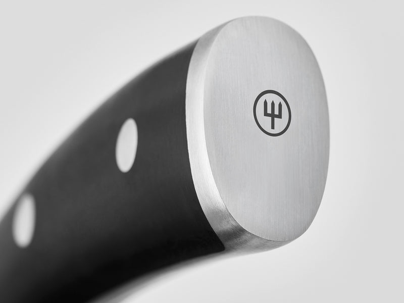 Classic Ikon 2-Piece Santoku Set close-up of the polished steel end cap with logo on a black ergonomic handle featuring full tang construction for balanced control.