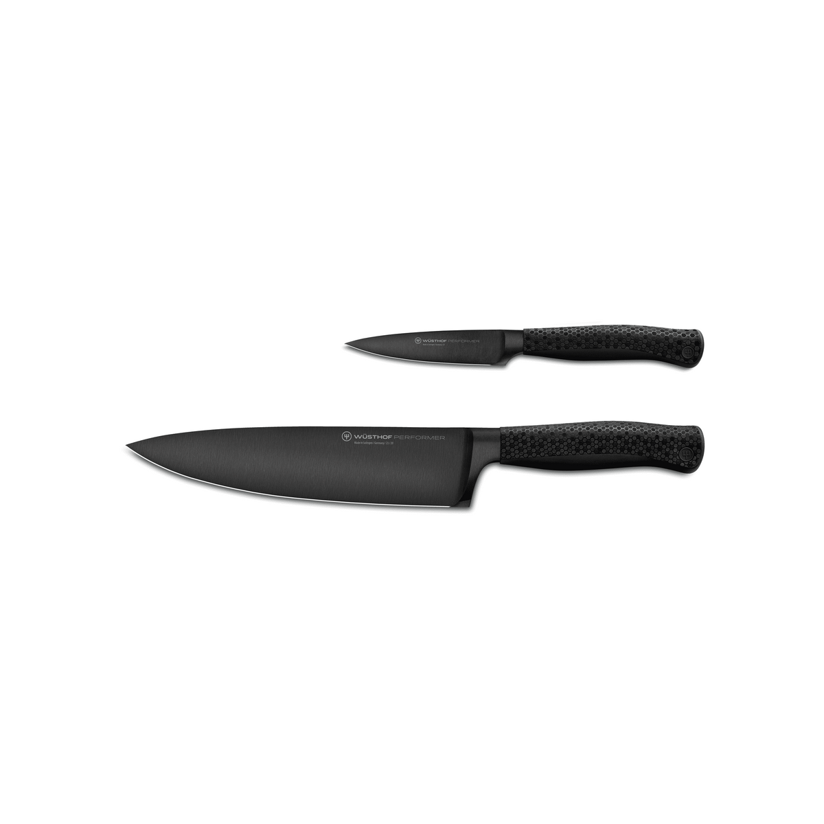 Performer 2-Piece Starter Set featuring a forged German chef's knife and paring knife with textured black ergonomic handles for precise kitchen use.