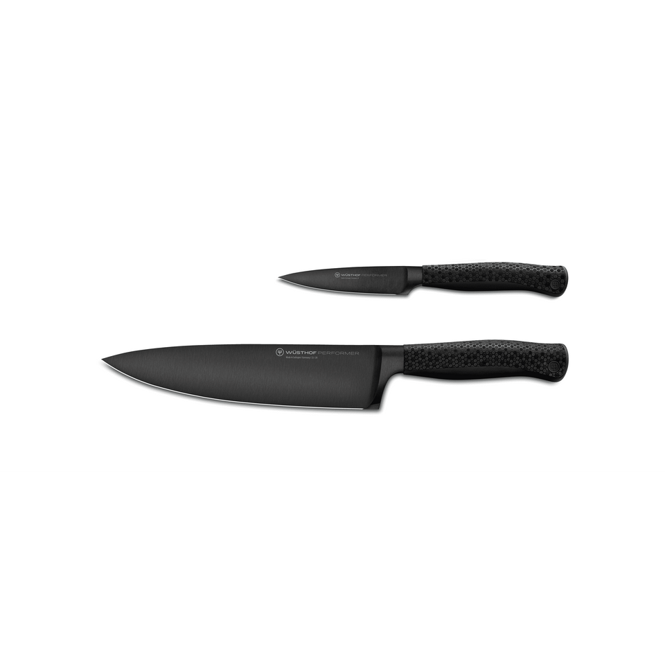 Performer 2-Piece Starter Set featuring a forged German chef's knife and paring knife with textured black ergonomic handles for precise kitchen use.