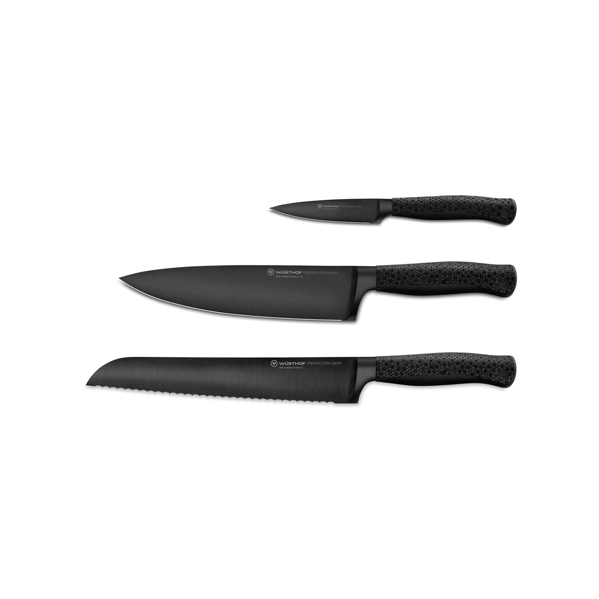 Performer 3-Piece Starter Set featuring black forged German steel knives with textured ergonomic handles, including chef’s, serrated, and paring knives.