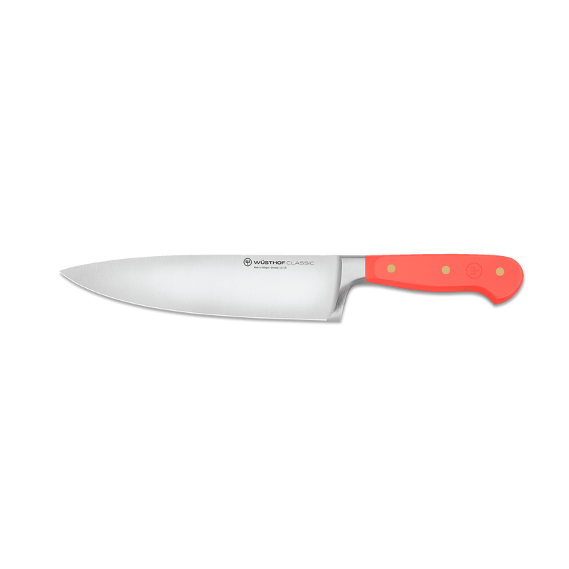 Classic 3-Piece Essential Knife Set - Coral Peach featuring a forged German chef’s knife with a sharp stainless steel blade and ergonomic coral peach handle with brass rivets.