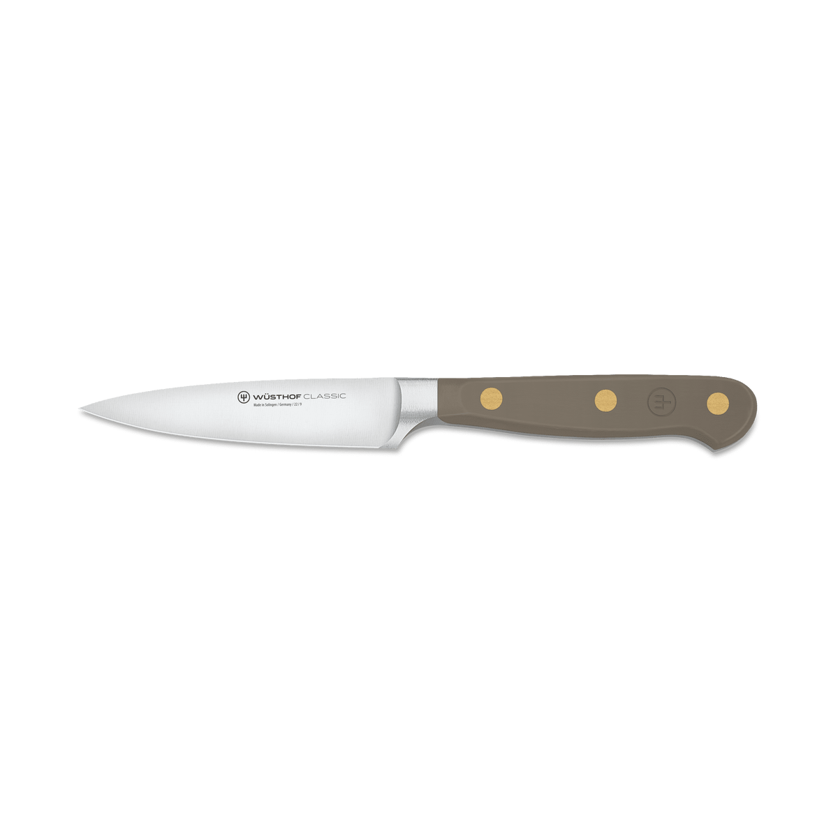 Classic 3 1/2" Paring Knife with a sharp forged German steel blade and a smooth taupe handle featuring three brass rivets and an ergonomic design for precise kitchen tasks.