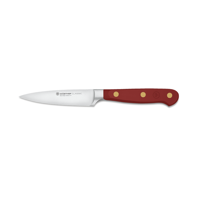 Classic 2-Piece Knife Set - Tasty Sumac showcasing a forged German paring knife with a sharp stainless steel blade and deep red ergonomic handle with brass rivets.