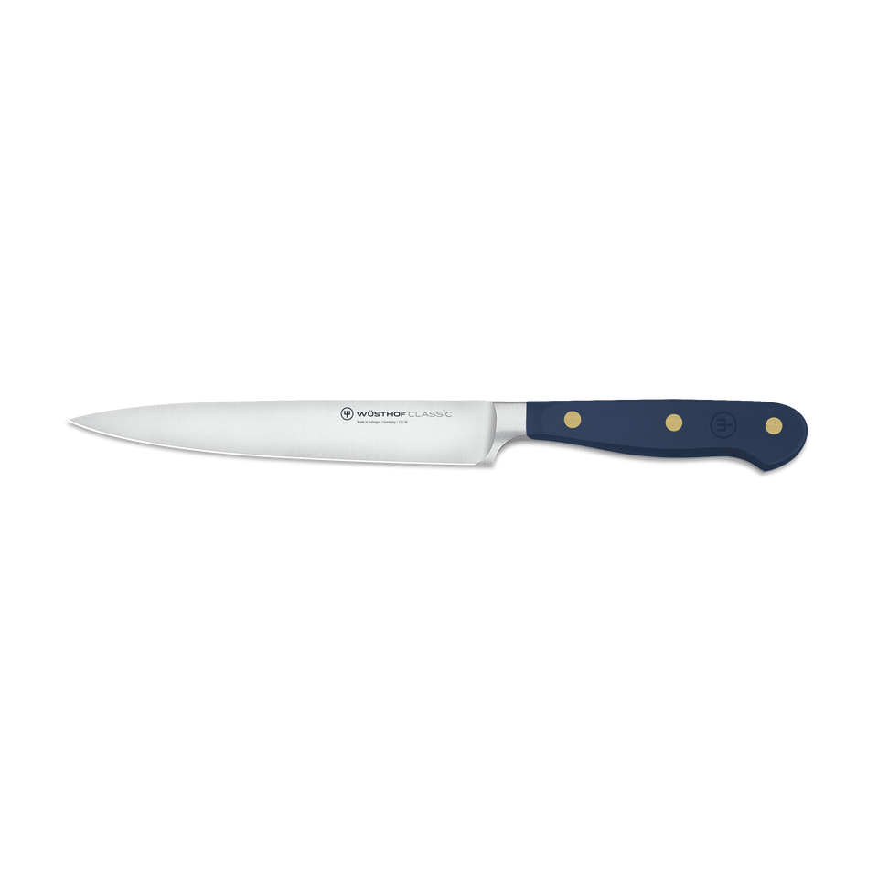 Classic 6" Utility Knife with a slim forged German steel blade and a navy ergonomic handle secured by three brass rivets for balanced precision cutting.