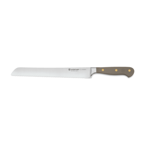 Classic 9" Precision Double-Serrated Bread Knife with a taupe ergonomic handle featuring brass rivets and a sharp forged stainless steel blade.