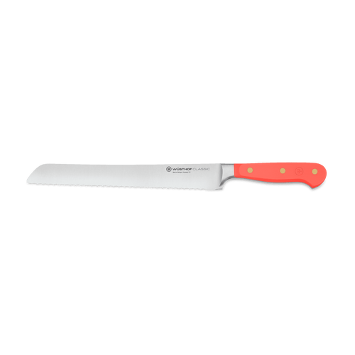 Classic 9" Precision Double-Serrated Bread Knife with bright red ergonomic handle and sharp forged German steel blade for smooth slicing.