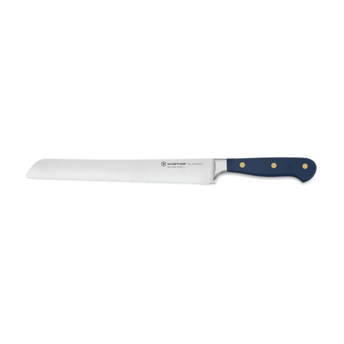 Classic 9" Precision Double-Serrated Bread Knife with a blue ergonomic handle featuring brass rivets and a sharp forged stainless steel blade.