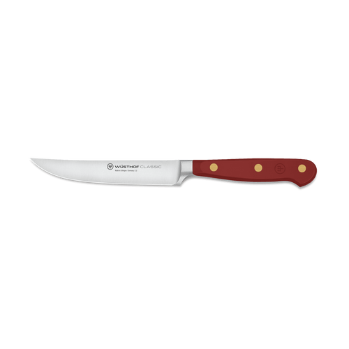 Classic 4 1/2" Steak Knife with a sharp stainless steel blade and a polished red handle featuring three brass rivets and ergonomic design for balanced control.