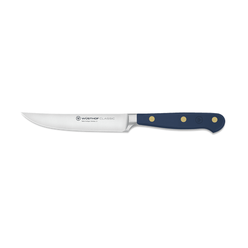 Classic 4 1/2" Steak Knife with a polished stainless steel blade and a dark blue ergonomic handle secured by three brass rivets for precise cutting and balance.