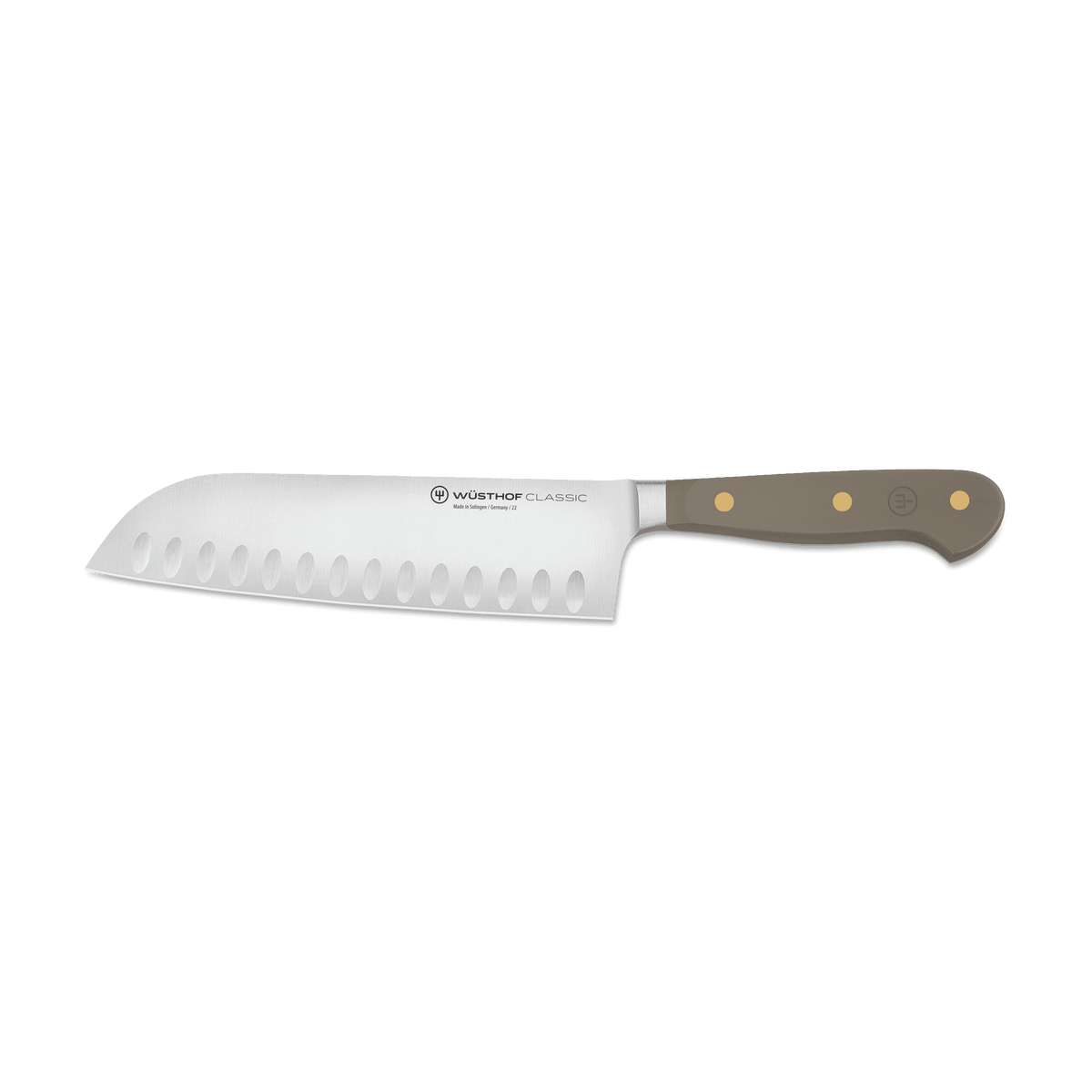 Classic 7" Hollow Edge Santoku with a German stainless steel blade featuring scalloped edges and a triple-riveted taupe handle for durability and control.