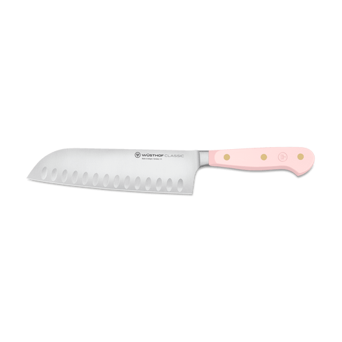 Classic 7" Hollow Edge Santoku with a smooth pastel pink triple-riveted handle and forged German steel blade designed for precise, effortless slicing.