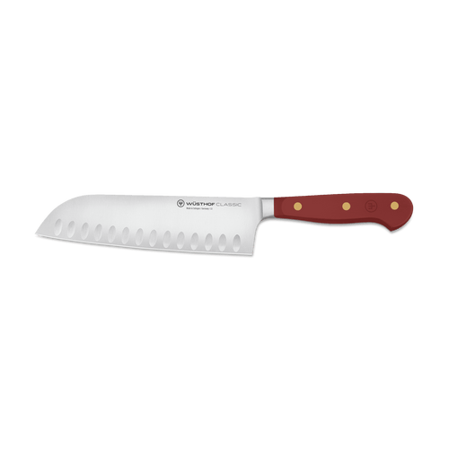 Classic 7" Hollow Edge Santoku featuring a forged German steel blade with scalloped edges and a triple-riveted wooden handle for balanced control.