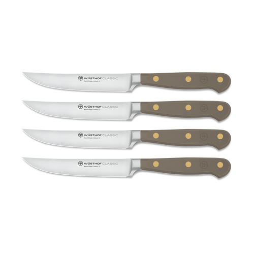 Classic 4-Piece Steak Knife Set featuring brown ergonomic handles with three brass rivets and sharp forged German steel blades with full tang construction.