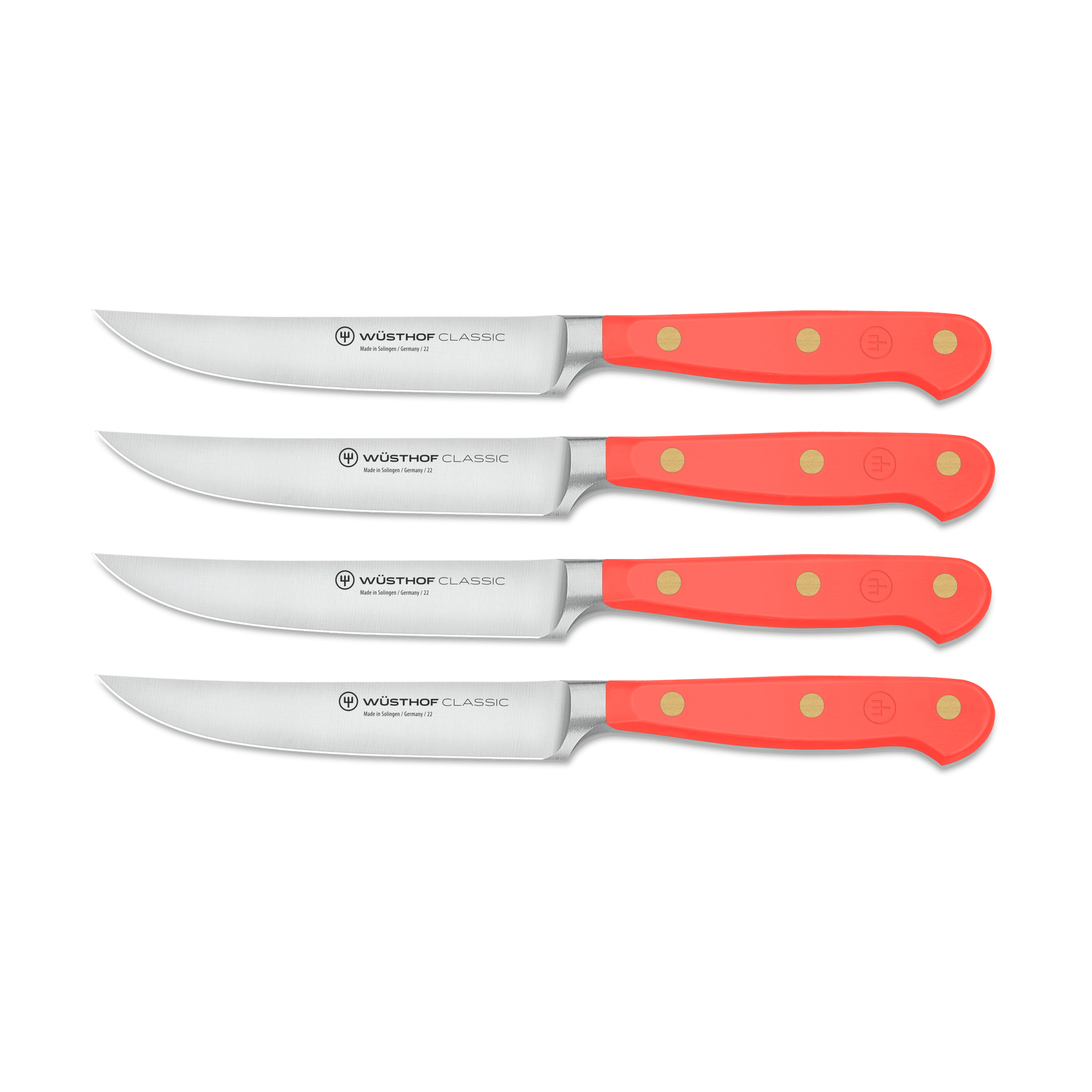 Classic 4-Piece Steak Knife Set featuring forged German steel blades and bright orange triple-riveted handles for a secure, ergonomic grip.