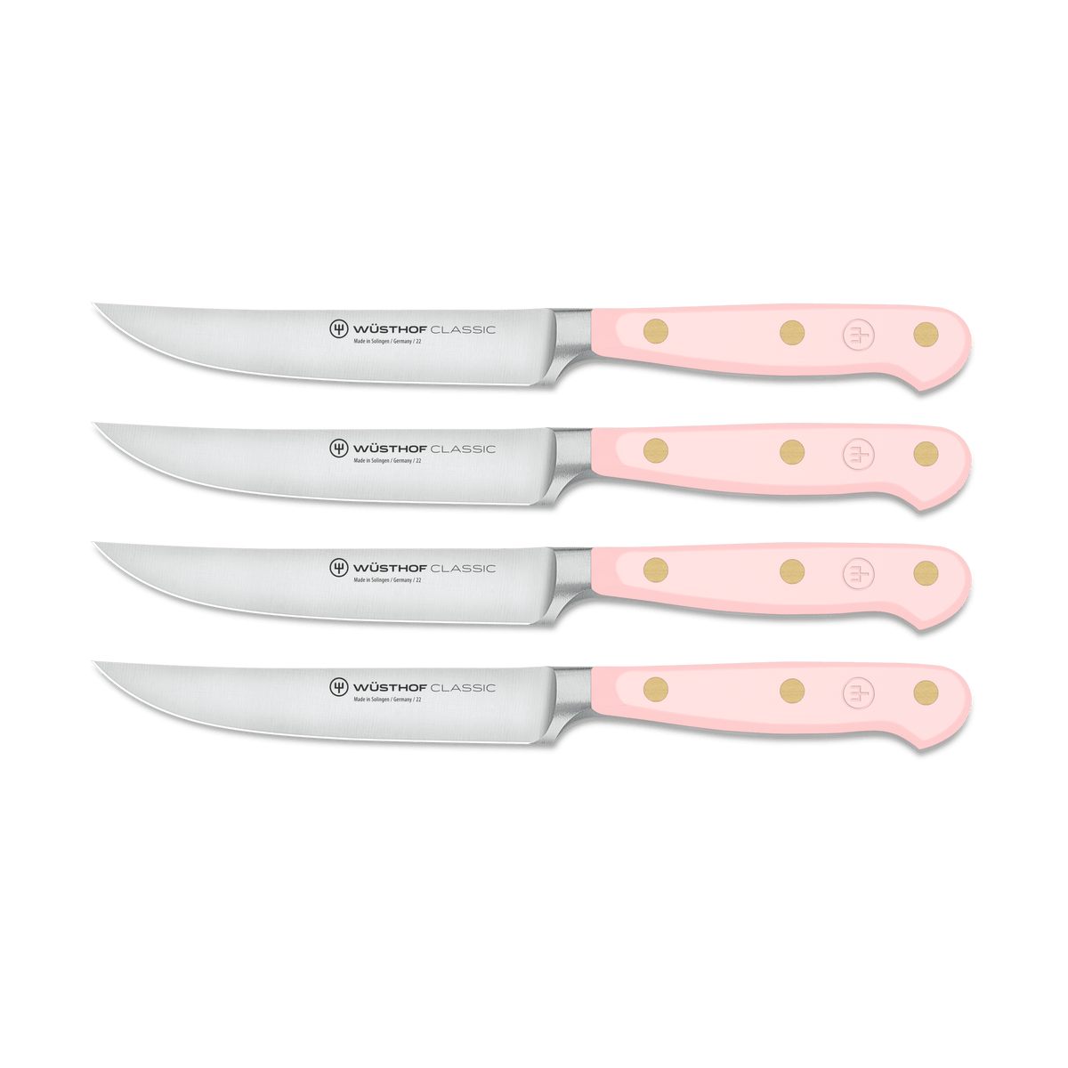 Classic 4-Piece Steak Knife Set featuring forged German steel blades and light pink triple-riveted handles with ergonomic design for precise cutting.
