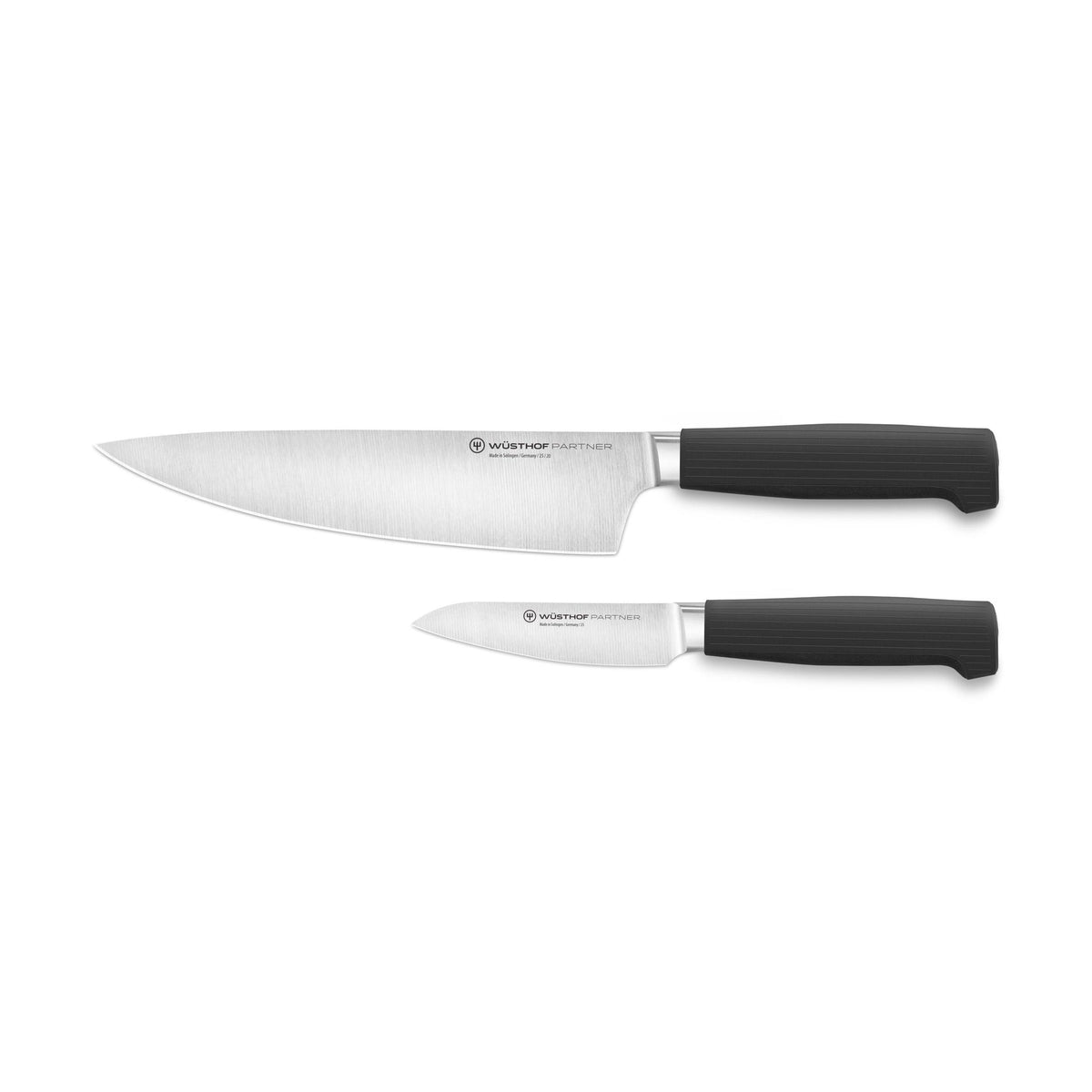Partner 2-Piece Knife Set featuring a forged German blade chef’s knife and paring knife with textured black ergonomic handles for versatile kitchen use.