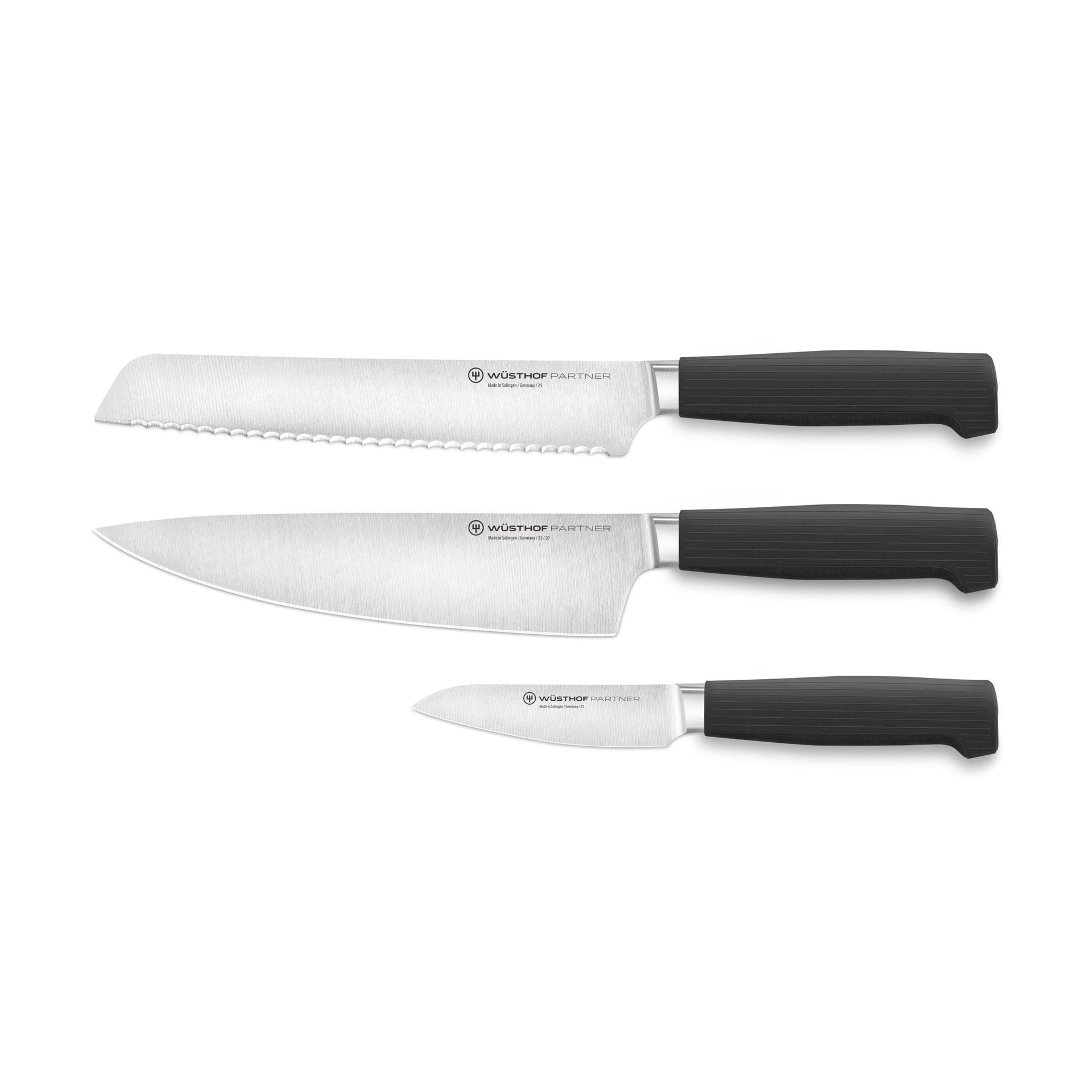 Partner 3-Piece Knife Set featuring forged German blades with sleek black ergonomic handles for precise cutting and versatile kitchen use.