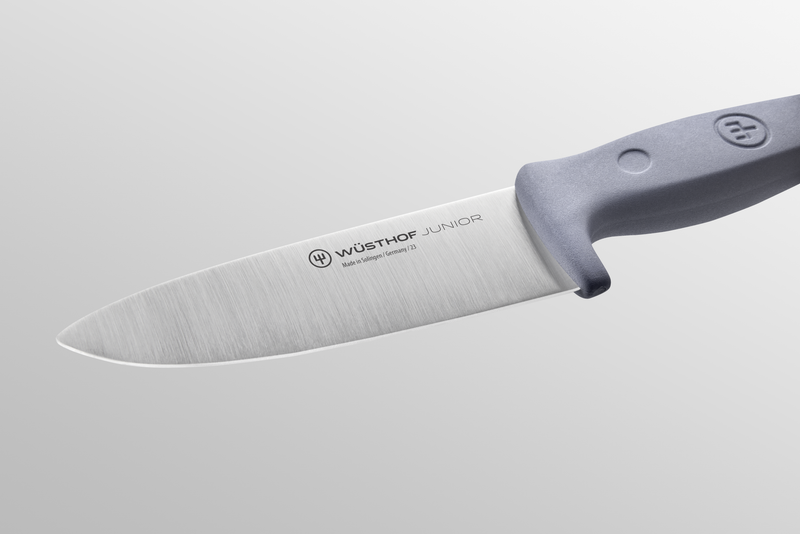 Junior 4" Chef’s Knife for Children featuring a forged German stainless steel blade and ergonomic gray handle designed for young cooks.