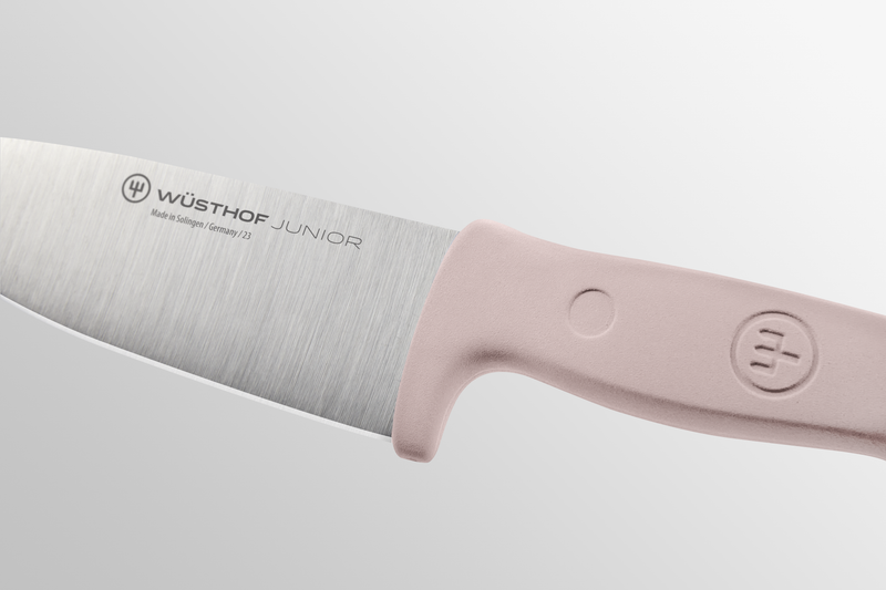 Junior 4" Chef’s Knife for Children with a forged German stainless steel blade and ergonomic soft pink handle designed for safe, comfortable use by young chefs.