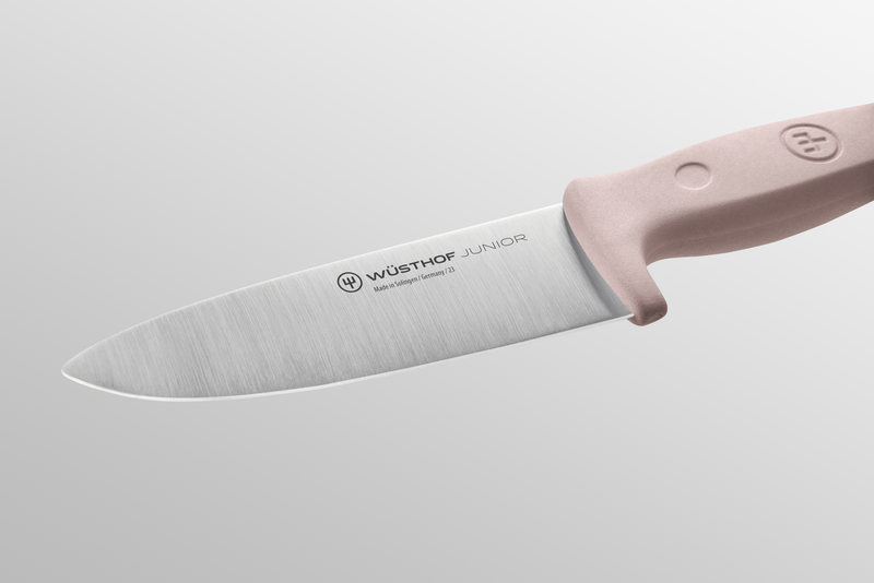 Junior 4" Chef’s Knife for Children with a forged German stainless steel blade and ergonomic soft pink handle designed for safe, comfortable use by young cooks.