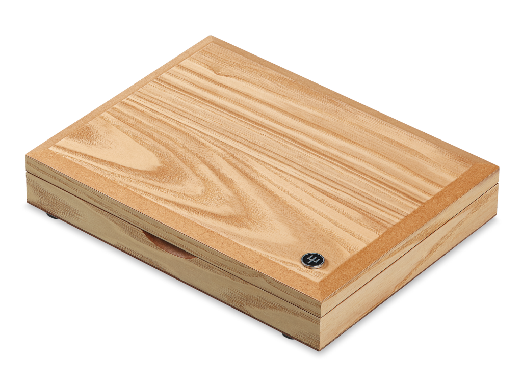 Natural wood storage box with a subtle WÜSTHOF emblem, designed to hold the 8-Piece Stainless Mignon Steak Knife Set securely.