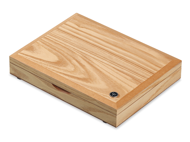 Natural wood storage box with a subtle WÜSTHOF emblem, designed to hold the 8-Piece Stainless Mignon Steak Knife Set securely.