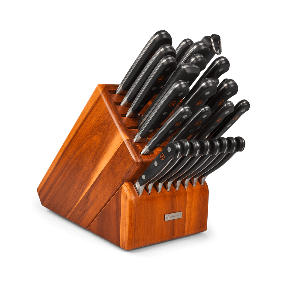 Classic 26-Piece Knife Block Set featuring forged German knives with black ergonomic handles and triple rivets, displayed in a polished wooden storage block.