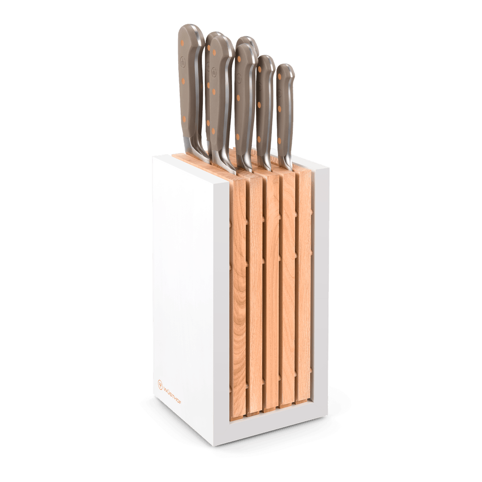Classic 8-Piece Designer Knife Block Set showcasing knives with smooth taupe handles and brass rivets in a modern white and wood block, ideal for chefs.