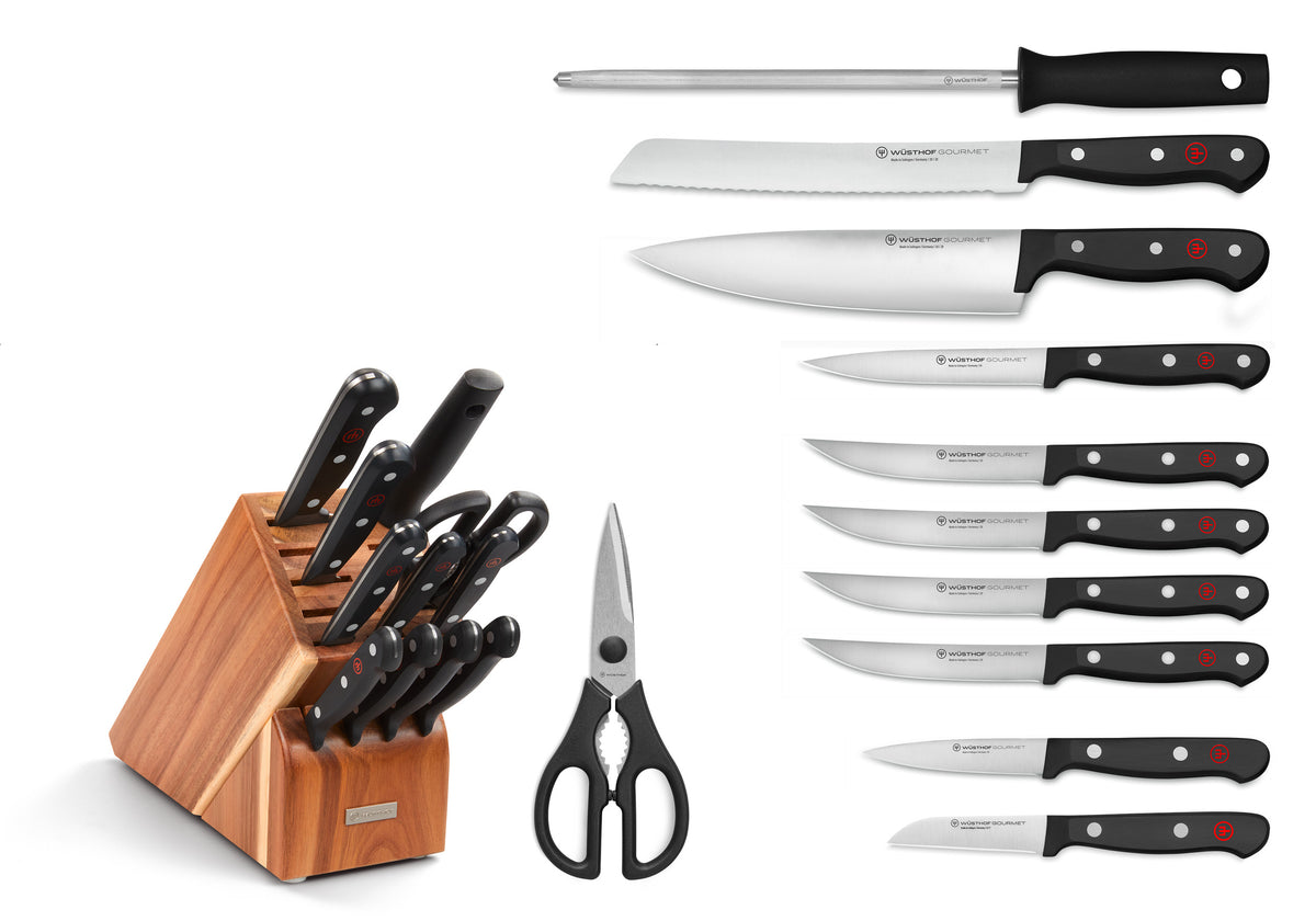 Gourmet 12-Piece Knife Block Set featuring forged German knives with black ergonomic handles including a chef’s knife, bread knife, honing steel, kitchen shears, and a wooden storage block.