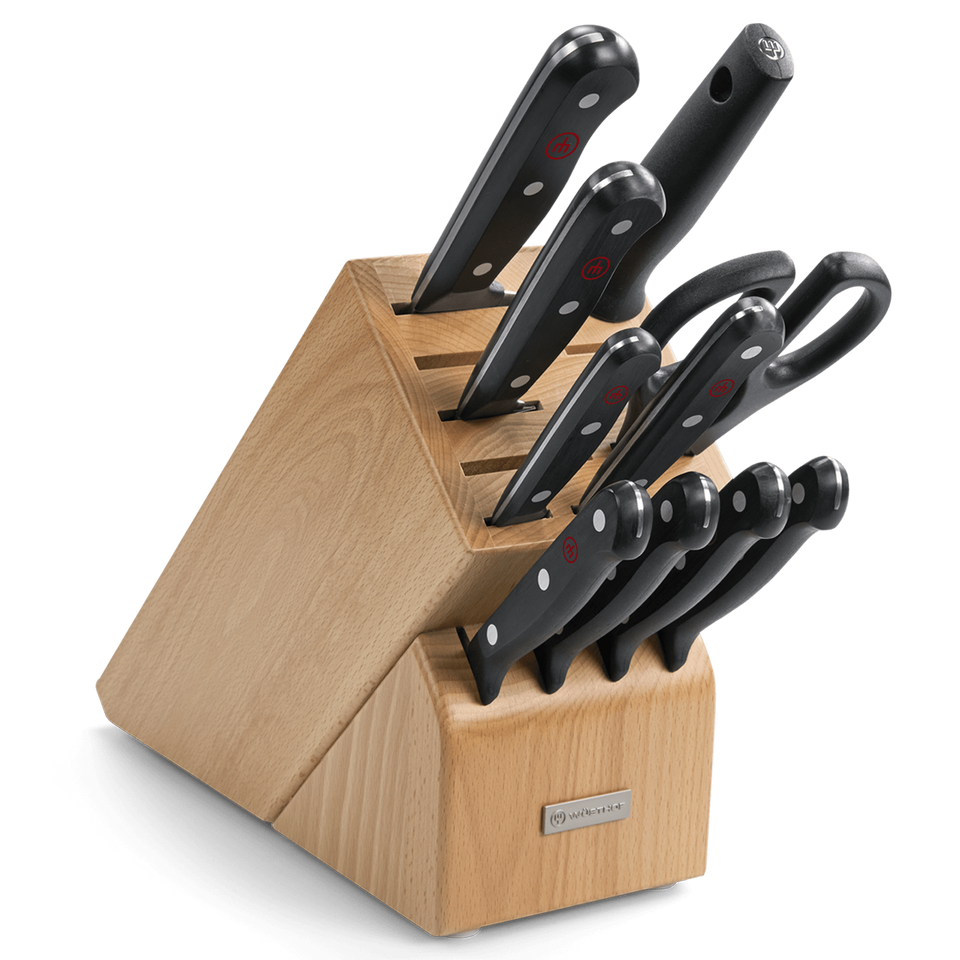 Gourmet 11-Piece Knife Block Set featuring forged German steel blades with durable black handles and a polished wooden storage block with kitchen shears.