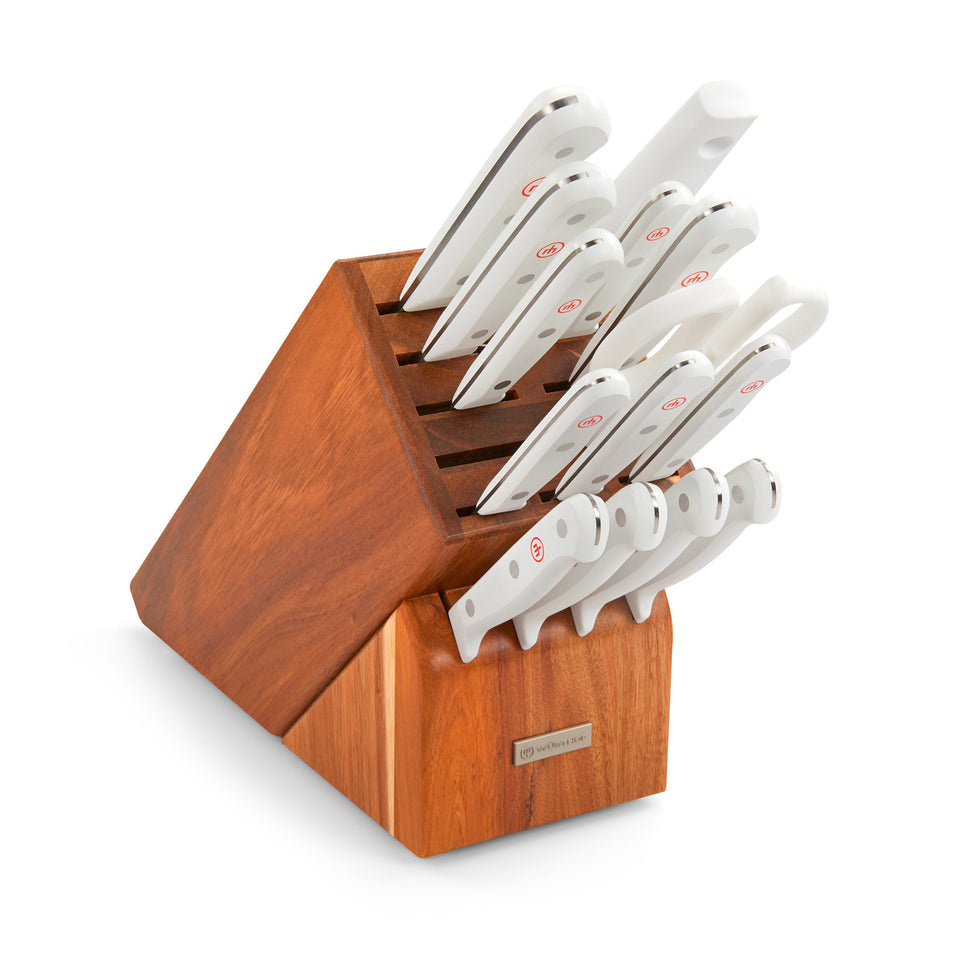 Gourmet 16-Piece Knife Block Set featuring sharp forged German knives with ergonomic white handles and a rich wooden storage block.