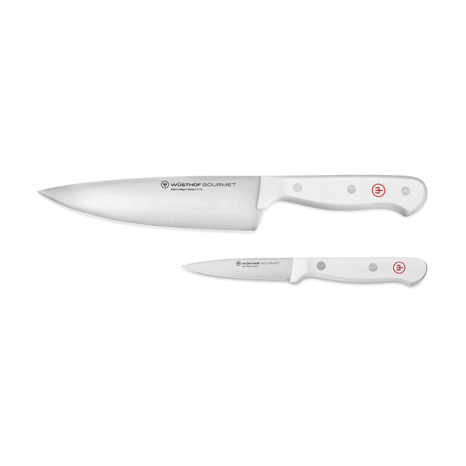 Gourmet 2-Piece Chef's Knife Set featuring a large chef’s knife and a smaller paring knife with white ergonomic handles and polished stainless steel forged blades.