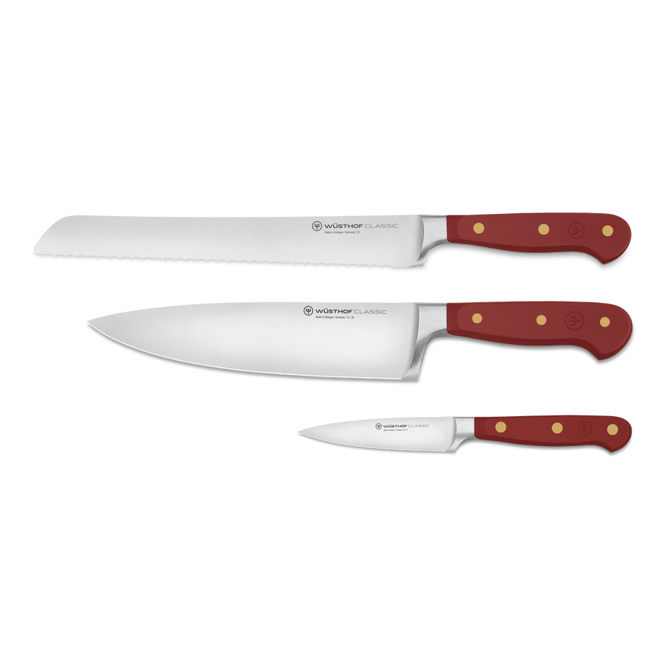 Classic 3-Piece Essential Knife Set - Tasty Sumac featuring forged German blades with serrated bread, chef’s, and paring knives and ergonomic rich sumac handles with brass rivets.