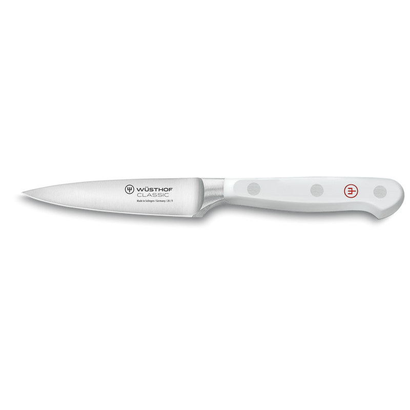 Classic 7-Piece Knife Block Set with Bread Knife featuring a forged German stainless steel paring knife with a smooth white ergonomic handle and triple rivets.