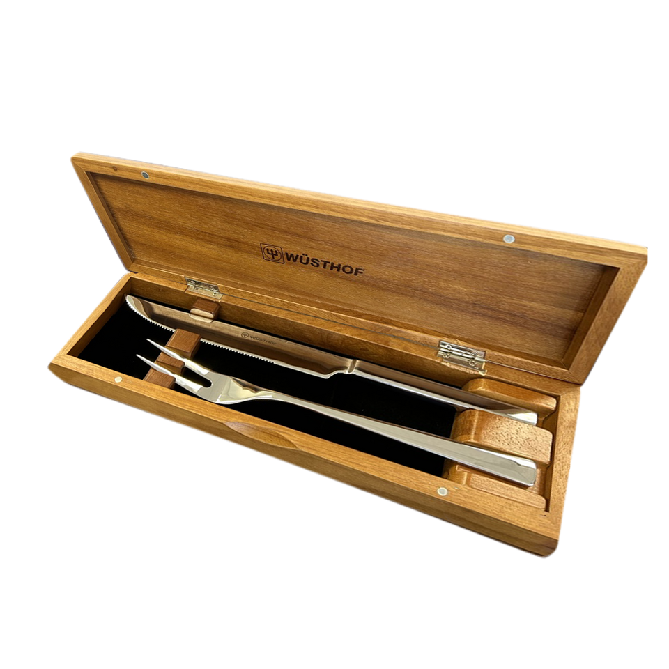 2-Piece Stainless Steel Gift Set featuring a sleek carving knife and matching fork with polished stainless steel handles in a wooden presentation box embossed with WÜSTHOF logo.
