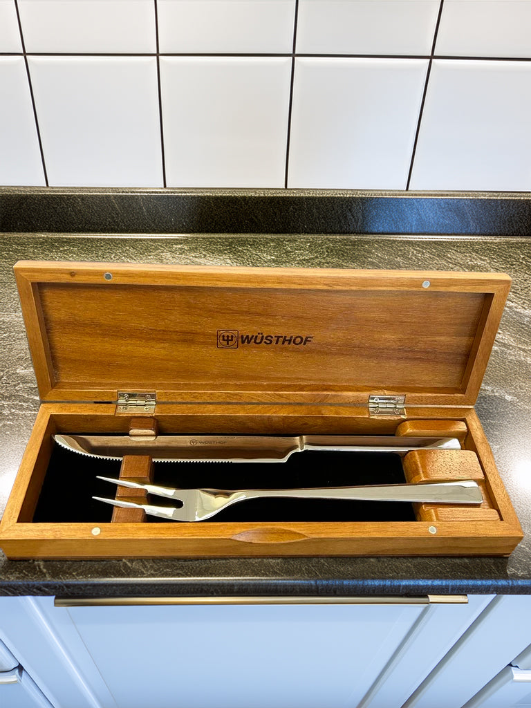 2-Piece Stainless Steel Gift Set featuring a serrated carving knife and a two-prong fork with polished stainless steel handles in a wooden presentation box.