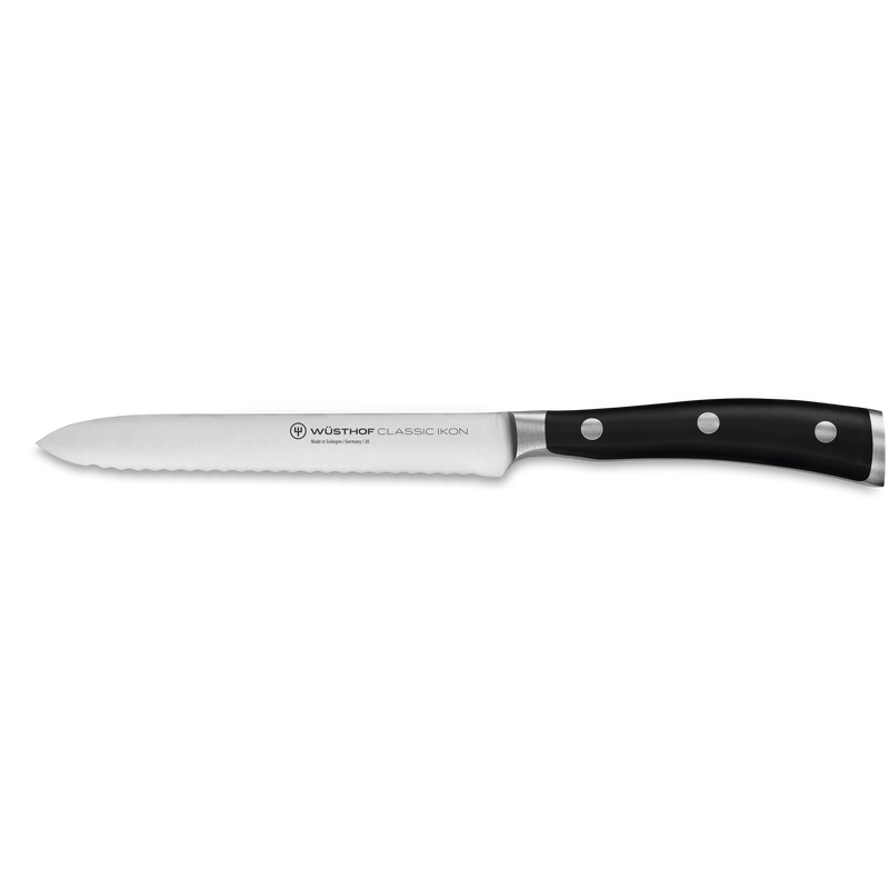 Classic Ikon 7-Piece Knife Block Set serrated bread knife with forged German steel blade and ergonomic black handle featuring triple rivets and polished bolster.