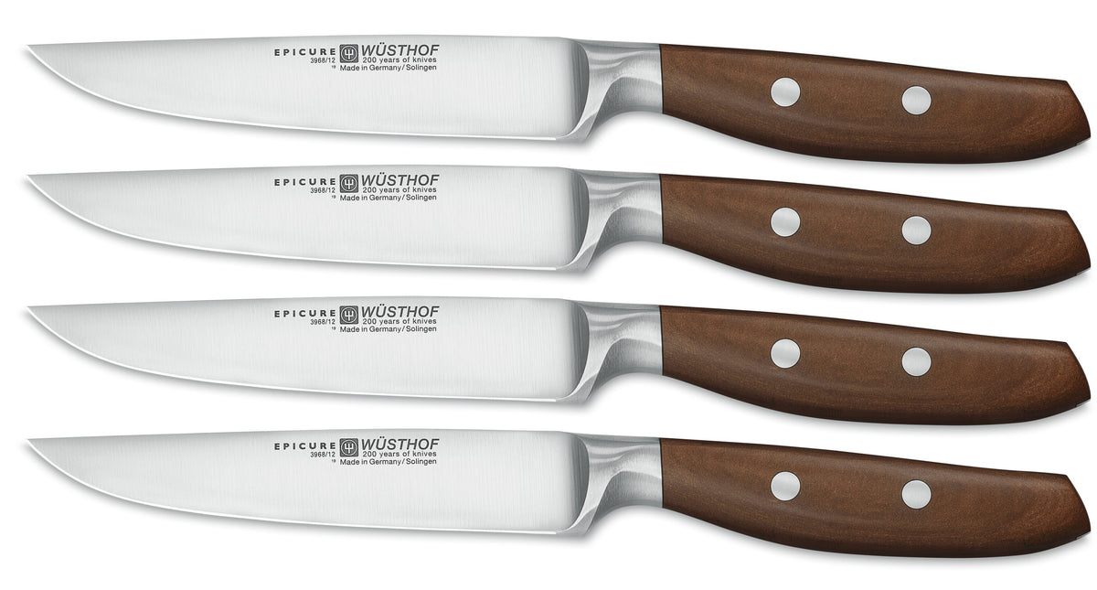 Epicure 4-Piece Steak Knife Set featuring sharp forged German blades with polished brown wooden handles secured by steel rivets for balanced cutting.