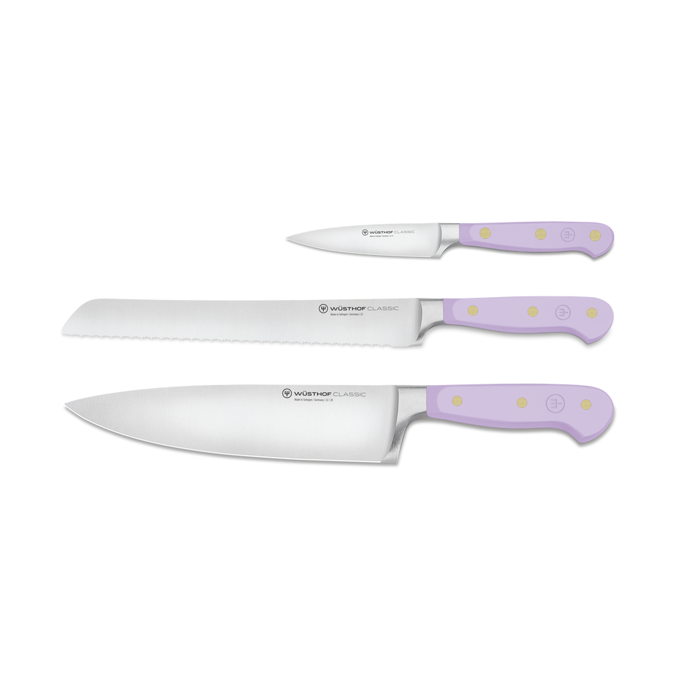Classic 3-Piece Essential Knife Set - Purple Yam featuring three forged German knives with sharp stainless steel blades and ergonomic purple handles with brass rivets.