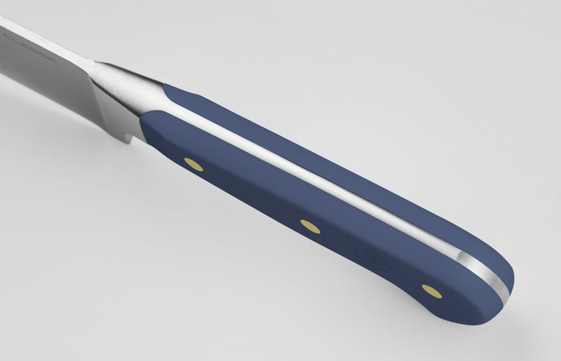 Classic 6" Utility Knife with a navy ergonomic handle featuring three brass rivets and a polished tang for enhanced balance and durability.