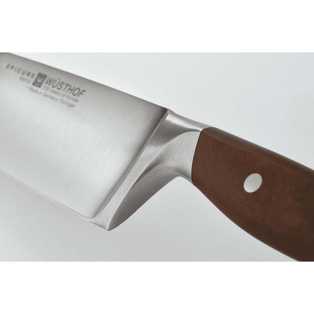 Epicure 3 1/2" Paring Knife with a finely honed German forged blade and a smoothly polished wooden handle secured by a single rivet for precise control.