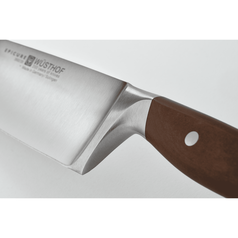 Epicure 3 1/2" Paring Knife with a finely honed German forged blade and a smoothly polished wooden handle secured by a single rivet for precise control.