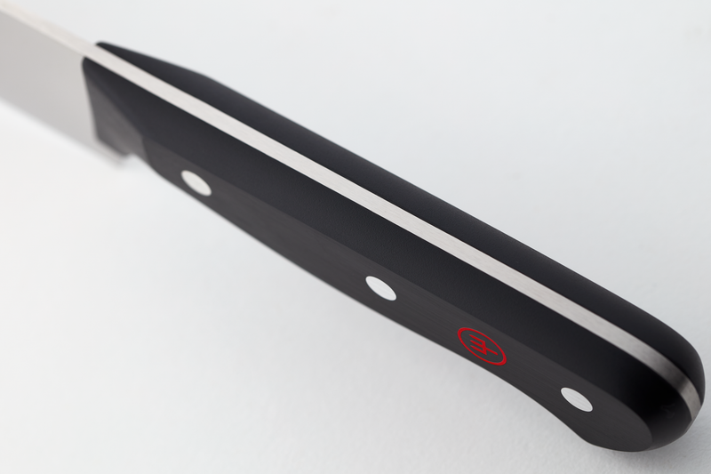 Gourmet 2 3/4" Trimming Knife close-up of a sleek black handle with three steel rivets and a subtle red logo, highlighting its sturdy full tang design.