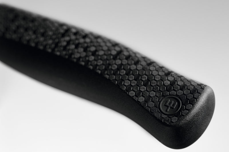Performer 8" Chef's Knife close-up of the textured ergonomic handle with hexagonal pattern and embedded logo for enhanced comfort and grip.
