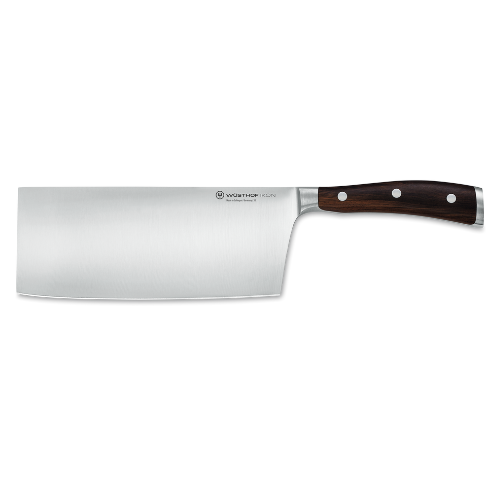 Ikon 7" Chinese Chef's Knife featuring a wide, sharp forged stainless steel blade and a polished dark wooden handle with three rivets for balance and durability.