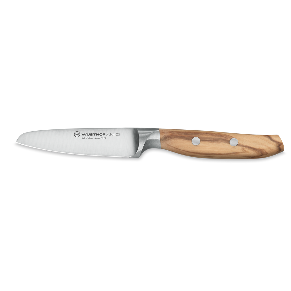Amici 3 1/2" Paring Knife featuring a finely forged stainless steel blade and a smooth olive wood handle secured with two metal rivets.