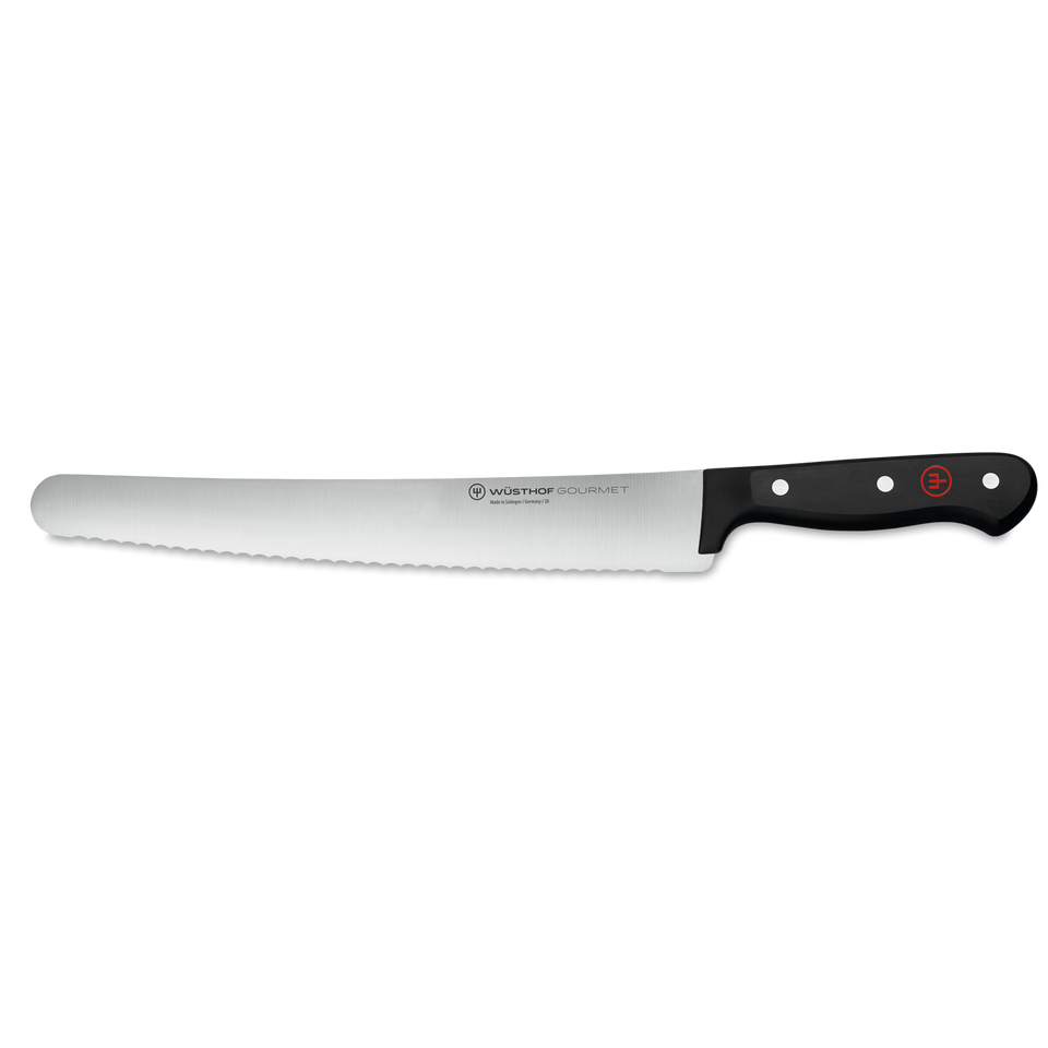 Gourmet 10" Confectioner's Knife featuring a serrated stainless steel blade and triple-riveted black handle for precise dessert slicing and presentation.