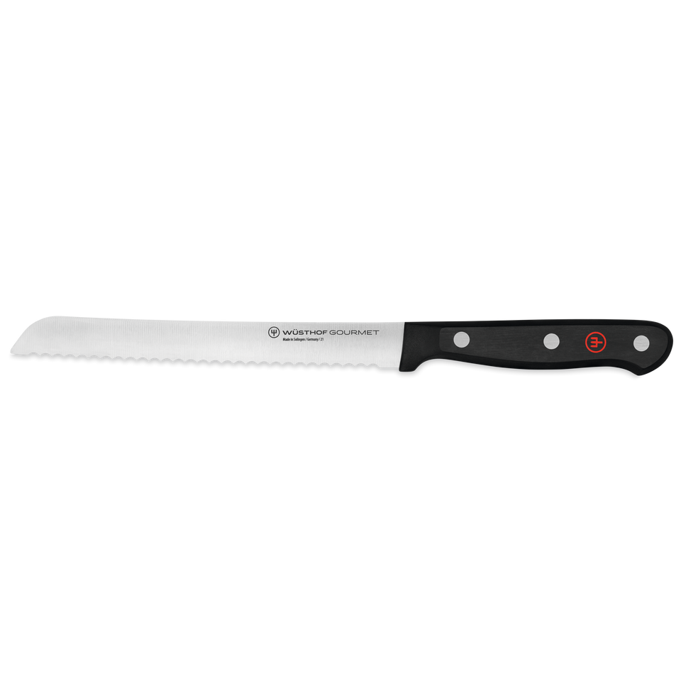 Gourmet 6" Serrated Utility Knife with a sharp serrated forged stainless steel blade and a durable black ergonomic handle for precise cutting tasks.