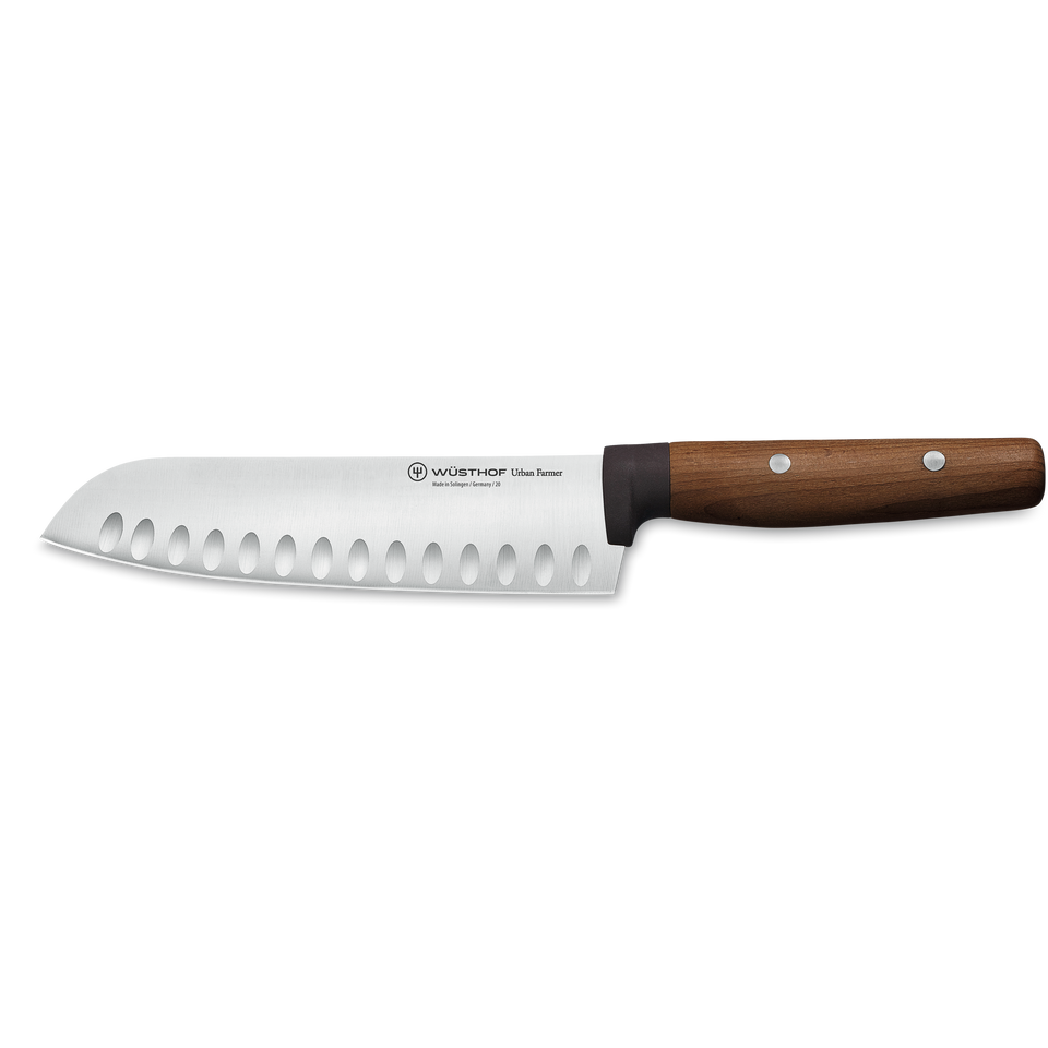 Urban Farmer 7" Hollow Edge Santoku featuring a forged stainless steel blade with hollow indentations and a polished wooden handle with three rivets.